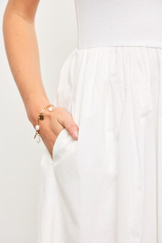 Close-up of shirred waist and pocket detail.